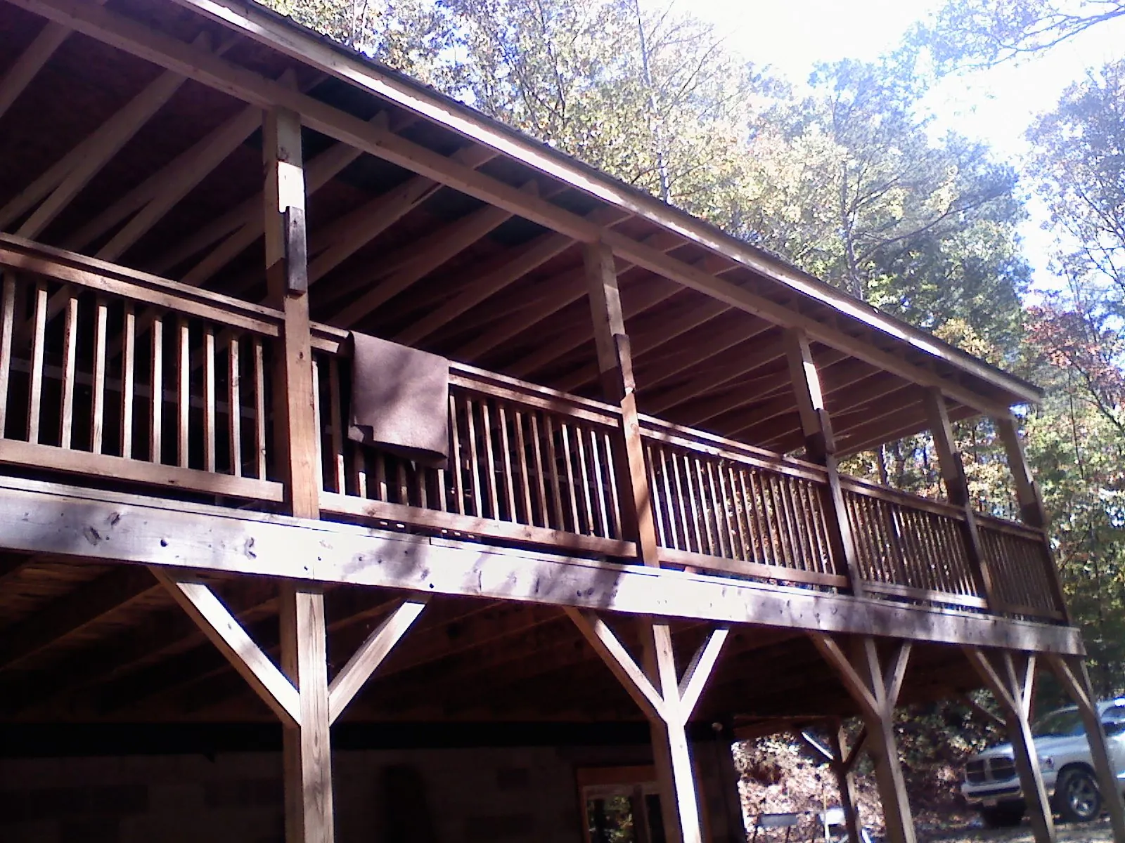 Timber framing under a new elevated porch and deck — Roof Leak Repair in West Finley by Roofing Brothers